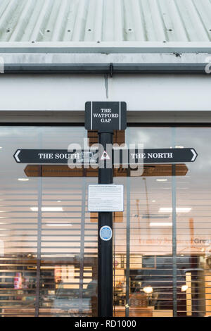 The Watford Gap signpost, Watford Gap Motorway Services M1 Northbound, pointing North and South, Watford Gap, Northamptonshire, England, UK Stock Photo