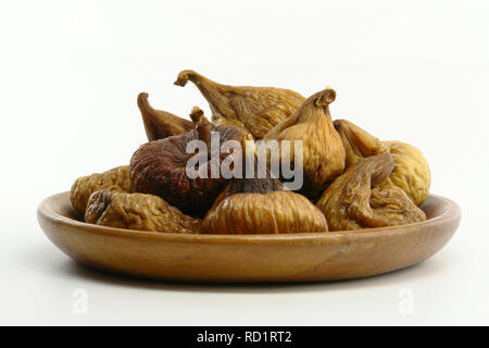 A Plate of Dried Figs (Isolated on white background) Stock Photo