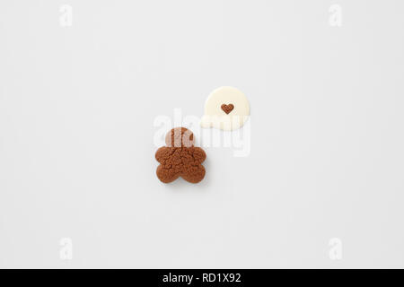 Gingerbread man & milk speech bubble love heart Stock Photo