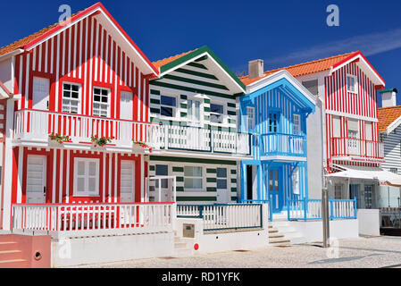 Colorful beach cottages with horizontal and vertical stripes Stock Photo