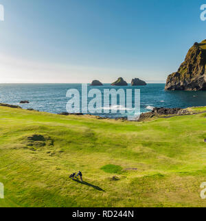 People playing Golf. Vestmannaeyjar Golf Course, Heimaey, Westman Islands, Iceland Stock Photo