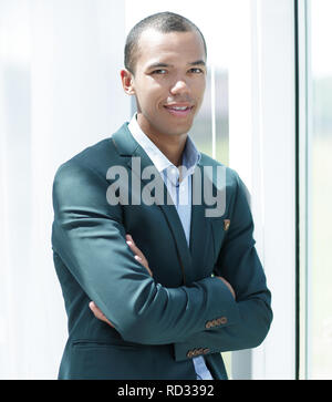 closeup portrait of confident young businessman on a light background Stock Photo