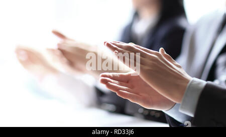 Close-up of business people clapping hands. Business seminar concept Stock Photo