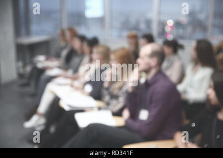 close up.blurred image of students in the conference hall Stock Photo