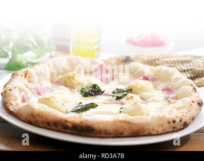 Close up of Hawaiian pizza, studio shot Stock Photo