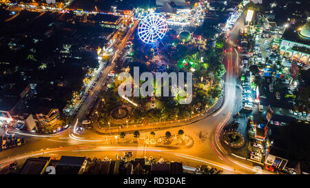 Aerial view of Alun Alun Malang at night, featuring a central circular ...