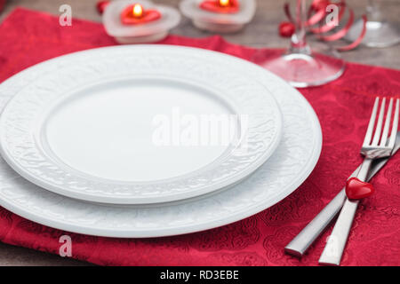 Place setting for Valentines day on holiday table . Stock Photo