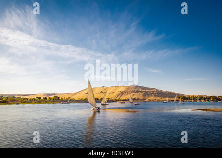 River nile with traditional boats at sunset. Live on the river Nile Stock Photo