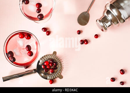Cranberry cocktail and cocktail making equipment Stock Photo
