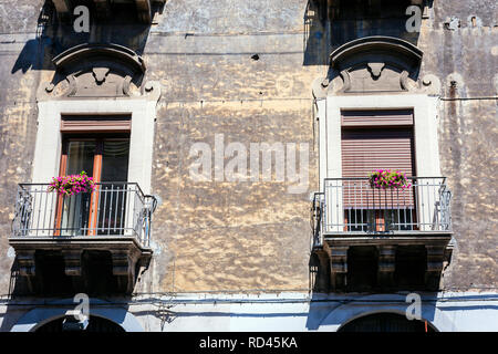 Balcony in a historic building in Catania, traditional architecture of Sicily, Italy Stock Photo