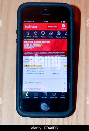 Ladbrokes sports gambling app on a smart phone Stock Photo