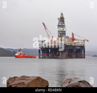 Kishorn, Scotland, UK. 16th January, 2019. This is the Ocean GreatWhite, world’s largest semi-submersible offshore drilling rig which weighs in at 60,800 tonnes and is a 6th generation harsh environment drilling rig capable of drilling down to 10,000m in 3,000m of water. With a draft of over 23 meters, the rig needs deep water for anchoring.  The Ocean GreatWhite has made its way from Singapore, via Las Palmas in the Canaries over the last five months assisted by the Alp Defender, a large ocean-going offshore supply vessel weighing in at 5600t. Credit: JASPERIMAGE/Alamy Live News Stock Photo