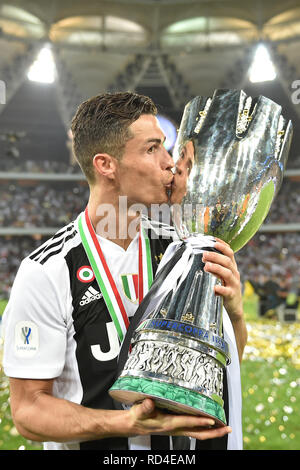 Cristiano Ronaldo of Juventus celebrates with the trophy the