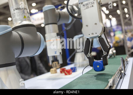 Tokyo, Japan. 17th Jan, 2019. Robot arms perform during the RoboDEX at Tokyo Big Sight. The 3rd Robot Development and Application Expo (RoboDEX) introduces the latest products and technologies from robot companies which runs from January 16 to 18. Credit: Rodrigo Reyes Marin/ZUMA Wire/Alamy Live News Stock Photo