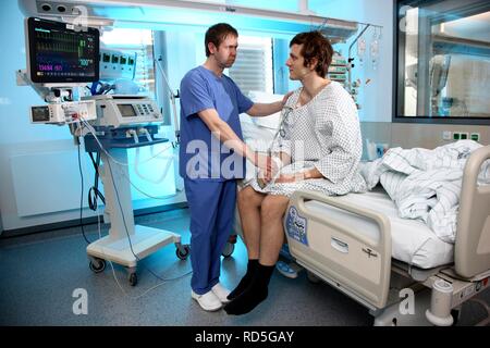 Male patient in intensive care unit Stock Photo - Alamy