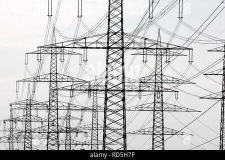 Transmission towers, electricity pylons, power lines, Neuss, North Rhine-Westphalia Stock Photo