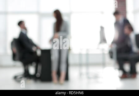 defocused photo of people working in office Stock Photo