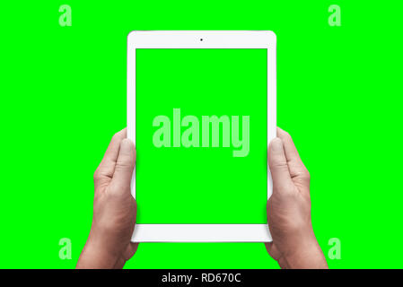 Chroma key isolated white tablet in hands. Stock Photo
