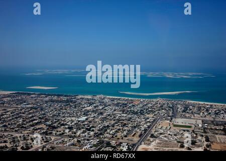 View of the artificial islands of The World off the coast of Dubai, United Arab Emirates, Middle East Stock Photo