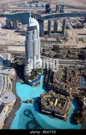 View from the Burj Khalifa on Oldtown Dubai, on the Fountain Lake and the 306-meter-high luxury hotel The Address in Downtown Stock Photo