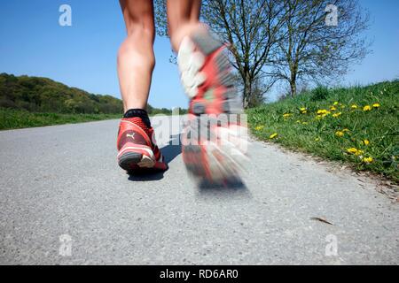 Running shoes, recreational runner jogging Stock Photo