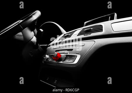 Modern Luxury sport car inside. Interior of prestige car. Black Leather. Car detailing. Dashboard. Media, climate and navigation control buttons. Soun Stock Photo