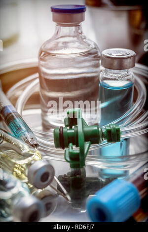 Multiple vial and syringe in a tray metal, conceptual image Stock Photo ...