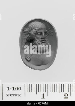 Amethyst ring stone with a bust of Dionysos Stock Photo