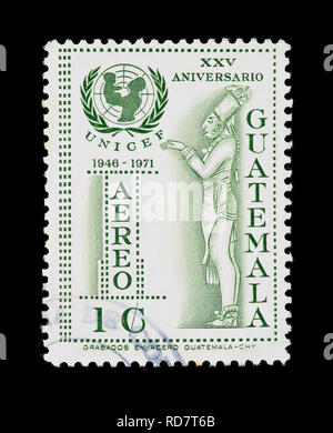 Postage stamp from Guatemala depicting the UNICEF emblem and Mayan figure Stock Photo