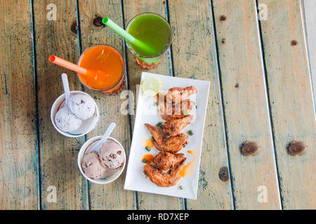 Chicken Wings Ice Cream and Drinks Stock Photo