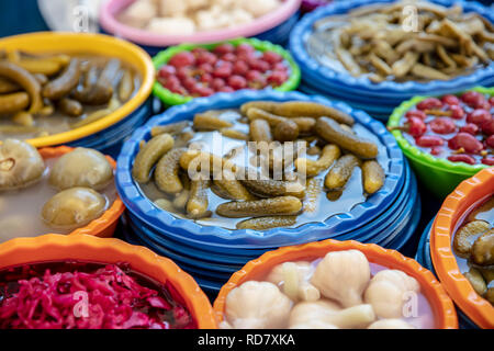 Turkish pickles in local market. Traditional Turkish pickles of various fruits and vegetables. Stock Photo