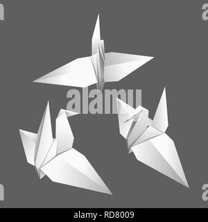 Three white paper origami birds on a gray background Stock Vector