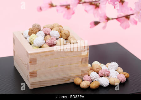 Japanese traditional event, soybean snacks are used on an annual event /Setsubun. Stock Photo