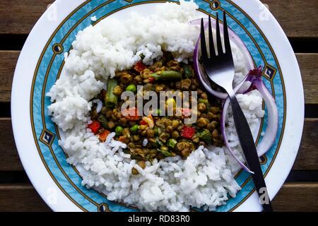 Homemade Lentil and Mixed Vegetable Curry with Rice Stock Photo