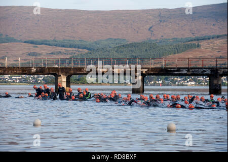 Swimmers get ready to start the Ben Nevis triathlon in loch Linnhe fort william Stock Photo