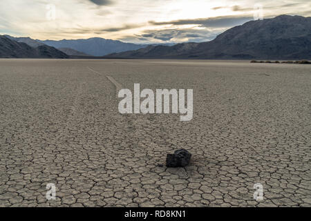 Sailing rocks leave trails in the mud as they move, Racetrack Playa, Death Valley National Park, California Stock Photo