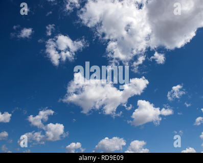 Beautiful white clouds with blue sky. Color shade gradient from white to blue for background wallpaper. Stock Photo
