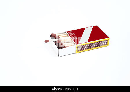 Picture of matches in the match box. Isolated on the white background. Stock Photo