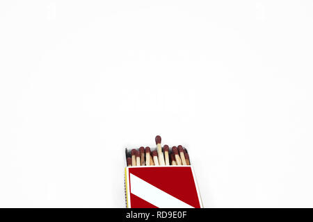 Portrait of matches in the match box. Isolated on the white background. Stock Photo