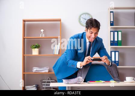 Employee stealing important information in industrial espionage concept Stock Photo