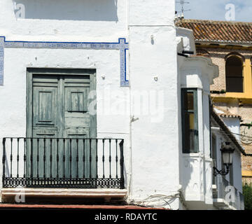 Stylish balcony with a metal railing, solid architectural element, a place of rest and relaxation, vintage decor, balcony Stock Photo