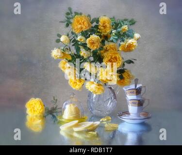 Still life with a bouquet of spray climbing roses Stock Photo