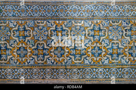 Portuguese mosaic on a wall with blue and orange forms. Stock Photo