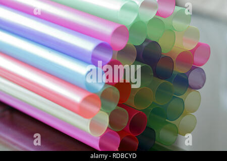 Large close up shot of colorful pastel plastic drinking straws Stock Photo