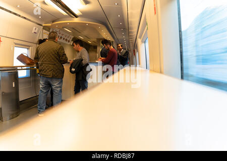 Passengers in the cafeteria wagon of a high-speed train Stock Photo