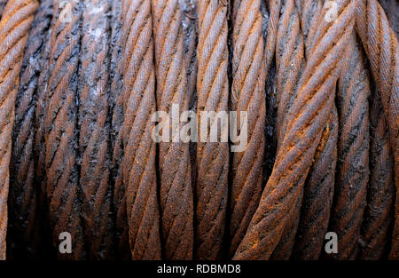 old rusty cable on winch Stock Photo