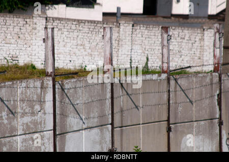 High resolution image. Territory fenced with a fence with a wire. Stock Photo