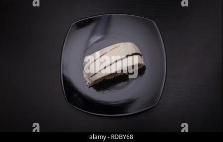 Vanilla Cake , GATEAUX , served on black dish Stock Photo