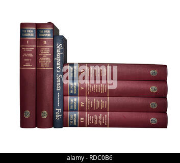 The Folio Society editions of The plays and sonnets of Shakespeare, arranged together with spines shown.  Isolated on white background. Stock Photo