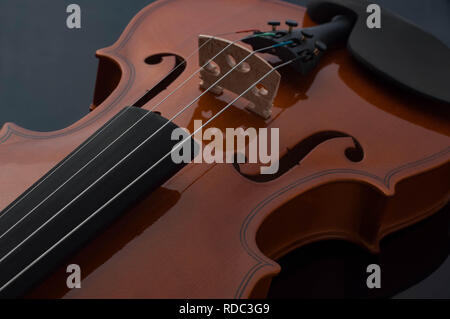 Violin musical instruments of orchestra closeup on black Stock Photo